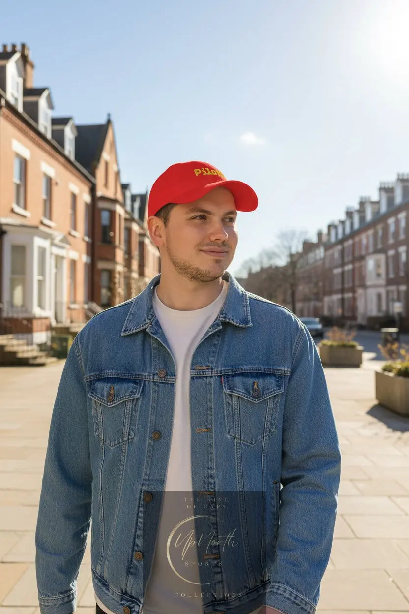 Male model wearing a Red Piloti Baseball Cap Embroidered with Yellow - UpNorth SPORTS