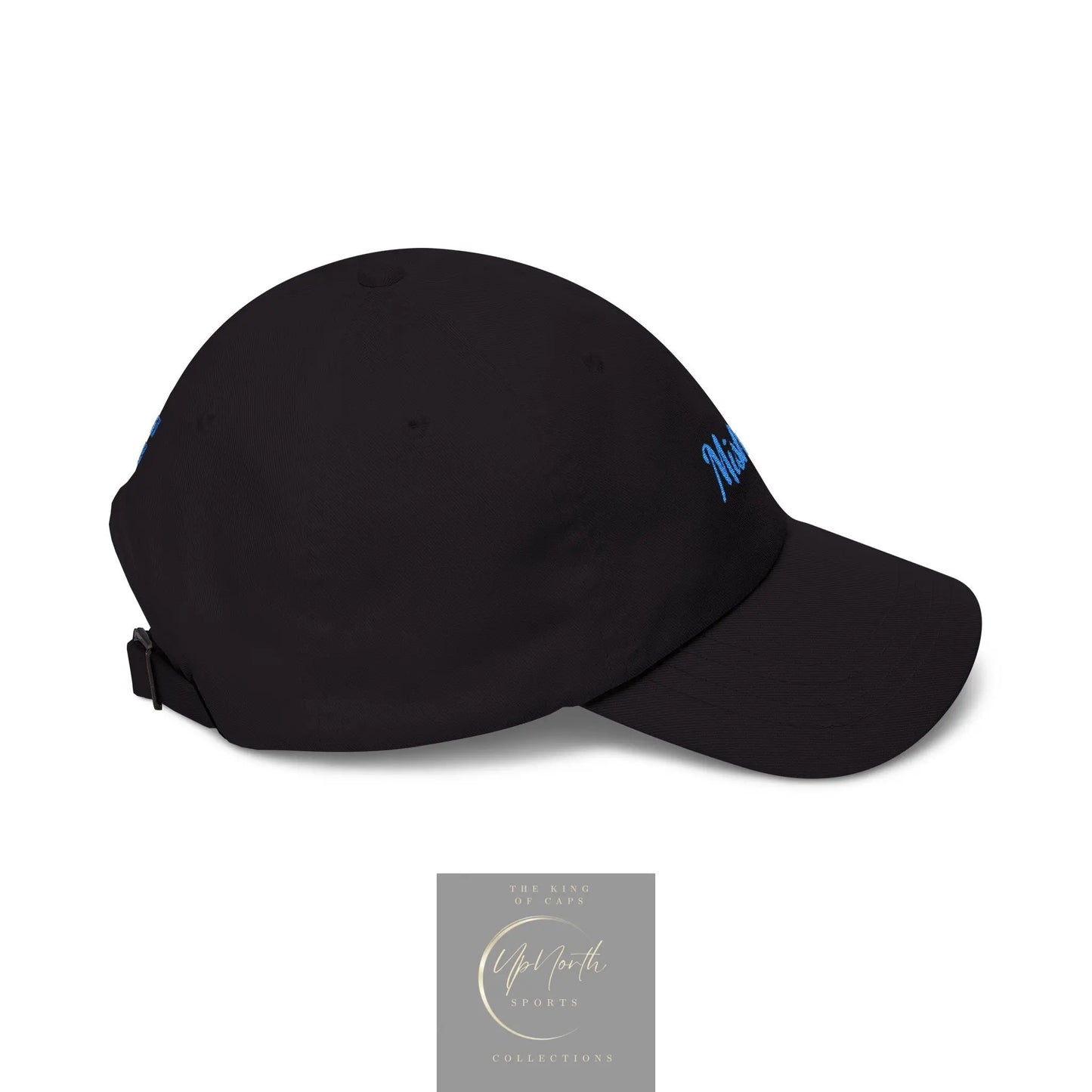 A dark gray baseball cap with a small white embroidered logo on the side, shown from a three-quarters angle on a white background.