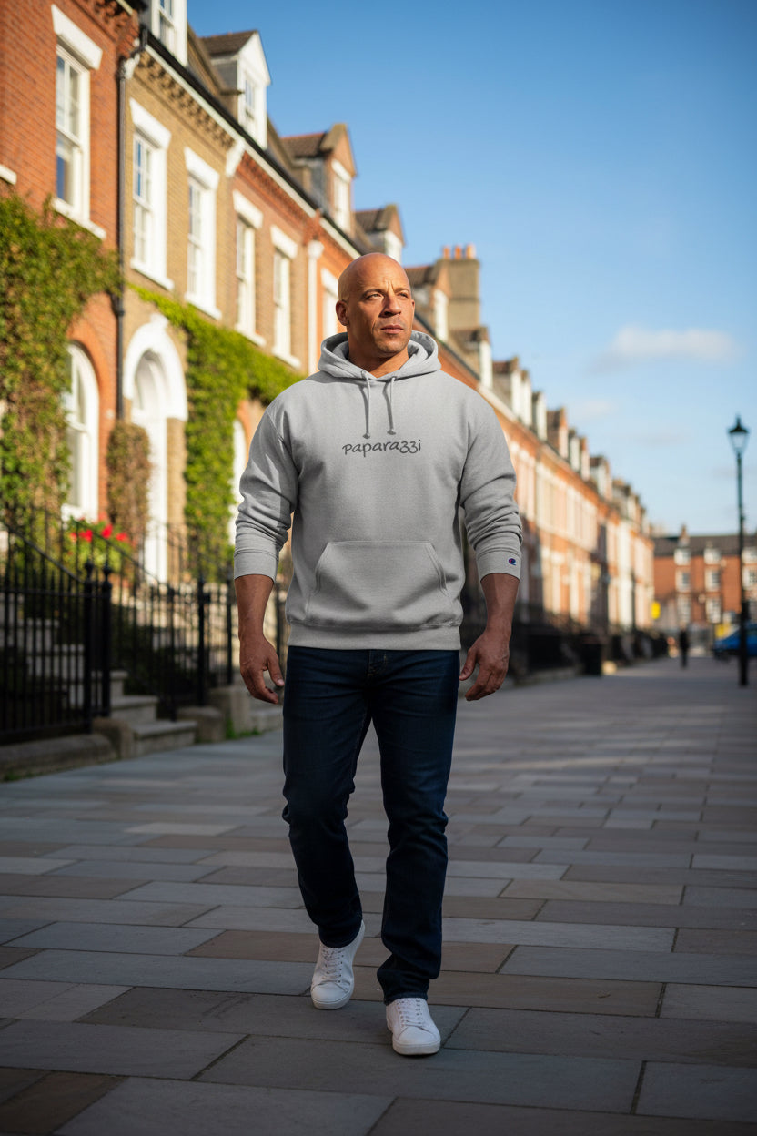 Male model wearing a Grey Paparazzi Hoodie from Champion - Paparazzi Original