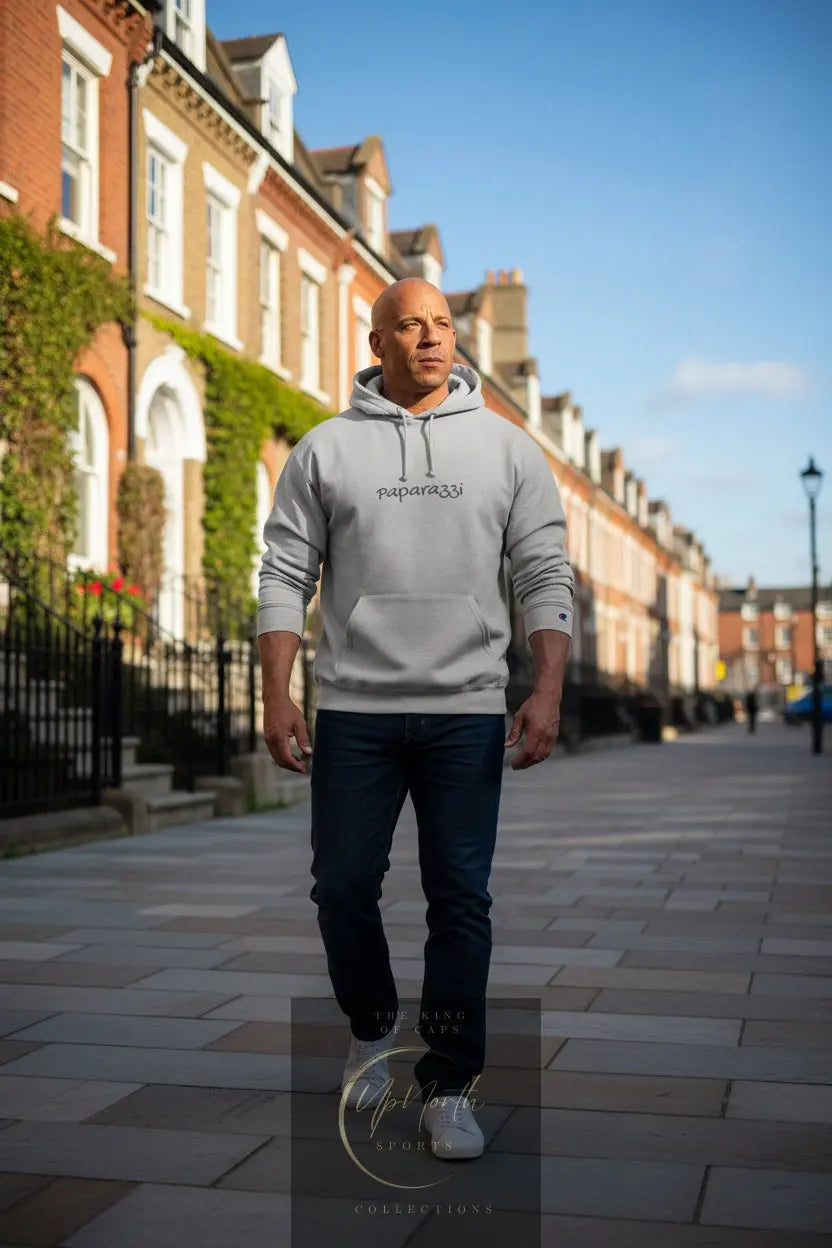 Male model wearing a Grey Paparazzi Hoodie from Champion - Paparazzi Original