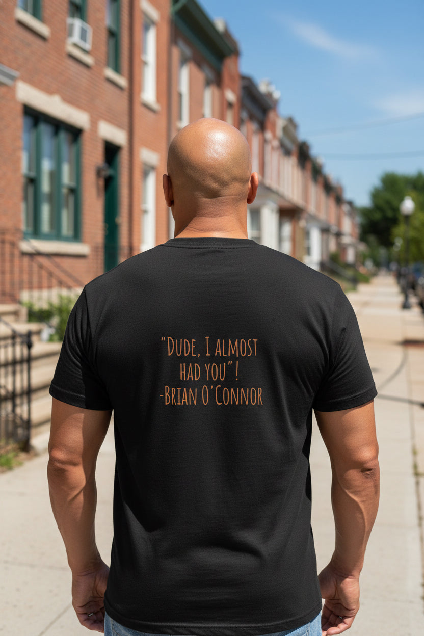 Male model wearing a Black Paul Walker DUDE T-Shirt showing backside - UpNorth SPORTS