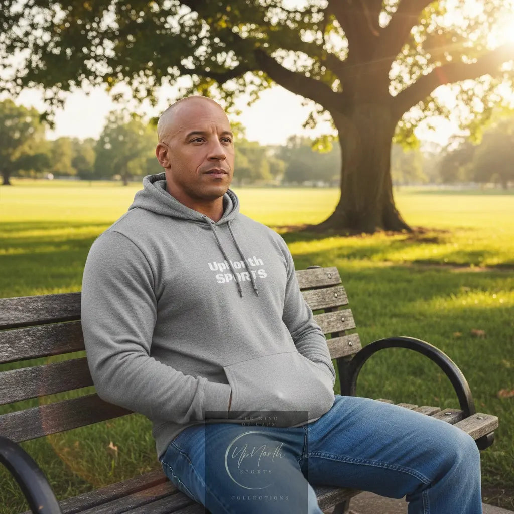 Male model wearing a Grey Heather Premium UpNorthSPORTS Adidas Hoodie - UpNorth SPORTS