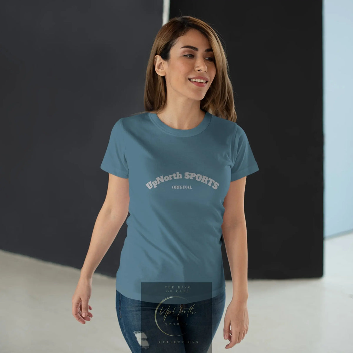 Female model wearing a Women T-Shirt stone blue with light grey showing front - UpNorth SPORTS
