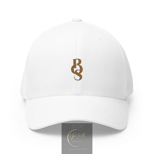 A white baseball cap with a brown embroidered monogram logo on the front, shown against a plain white background with a small brand tag above it.