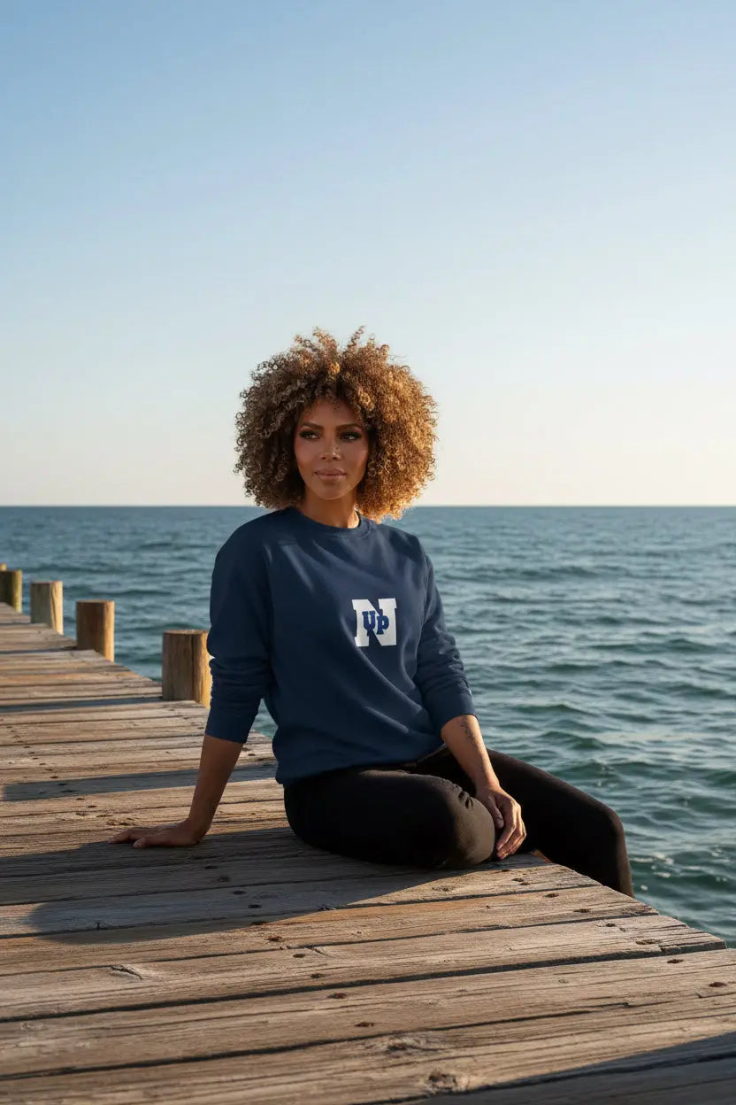 Woman model wearing a Navy UpN Champion Sweatshirt - UpNorth SPORTS