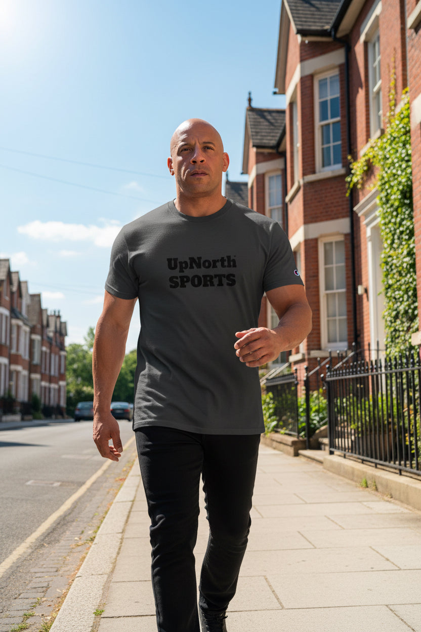 Male model wearing an UpNorth SPORTS Darkgrey Champion T-Shirt - UpNorth SPORTS