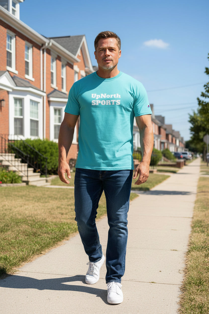 Male model wearing an UpNorthSPORTS Turquoise Champion T-Shirt - UpNorth SPORTS
