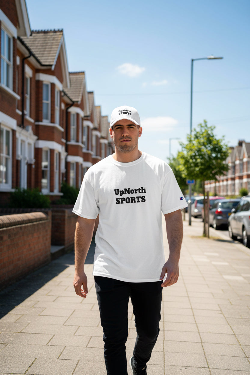 Male model wearing a UpNorthSPORTS White Black Champion T-shirt - UpNorth SPORTS