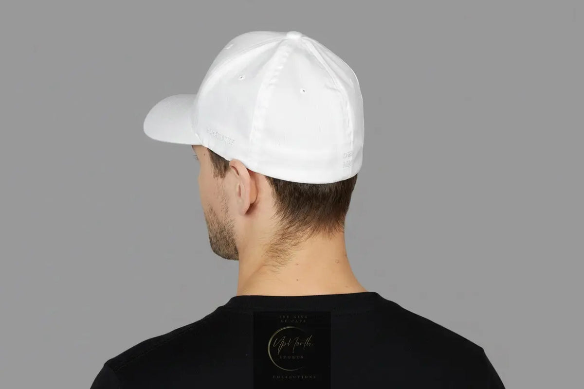 Male model wearing a White POS White Logo Closed Back Cap shown from left side - Paparazzi Original