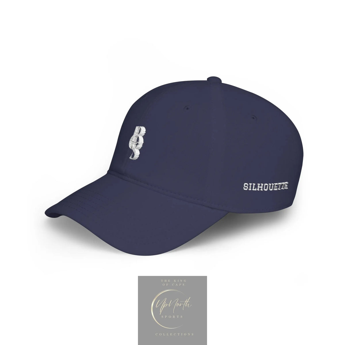 A navy blue baseball cap with a curved frame, featuring a white embroidered 'POS' monogram on the front and 'SILHOUETTE' text on the side, shown on a clean white background. - Paparazzi Original