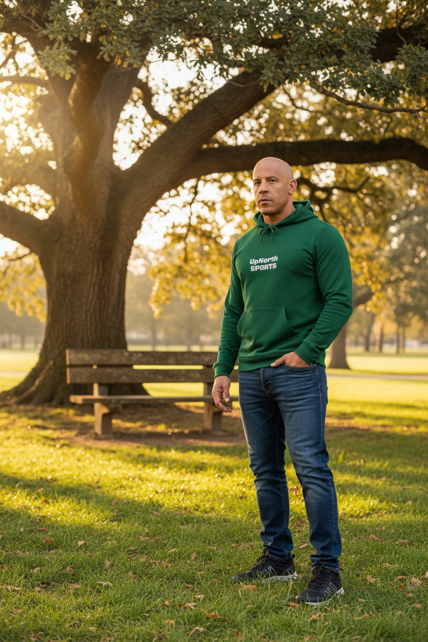 Male model wearing a Collegiate Green Premium UpNorthSPORTS Adidas Hoodie - UpNorth SPORTS