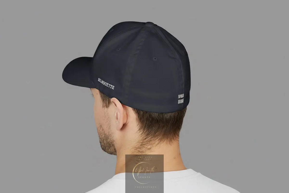 Male model wearing a Dark Navy POS White Logo Closed Back Cap shown from left side - Paparazzi Original