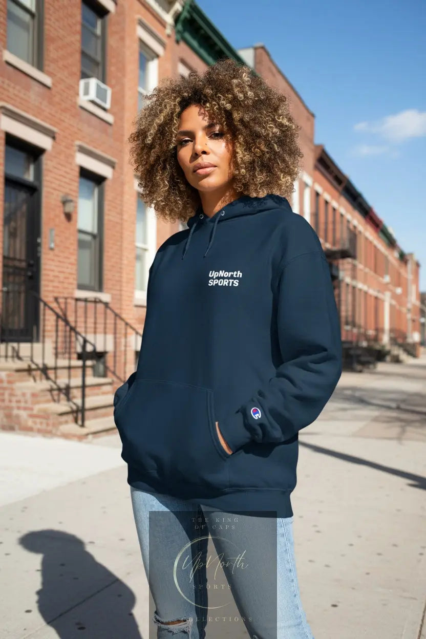 Woman model wearing a Navy UpNorth SPORTS White Logo Champion Hoodie - UpNorth SPORTS