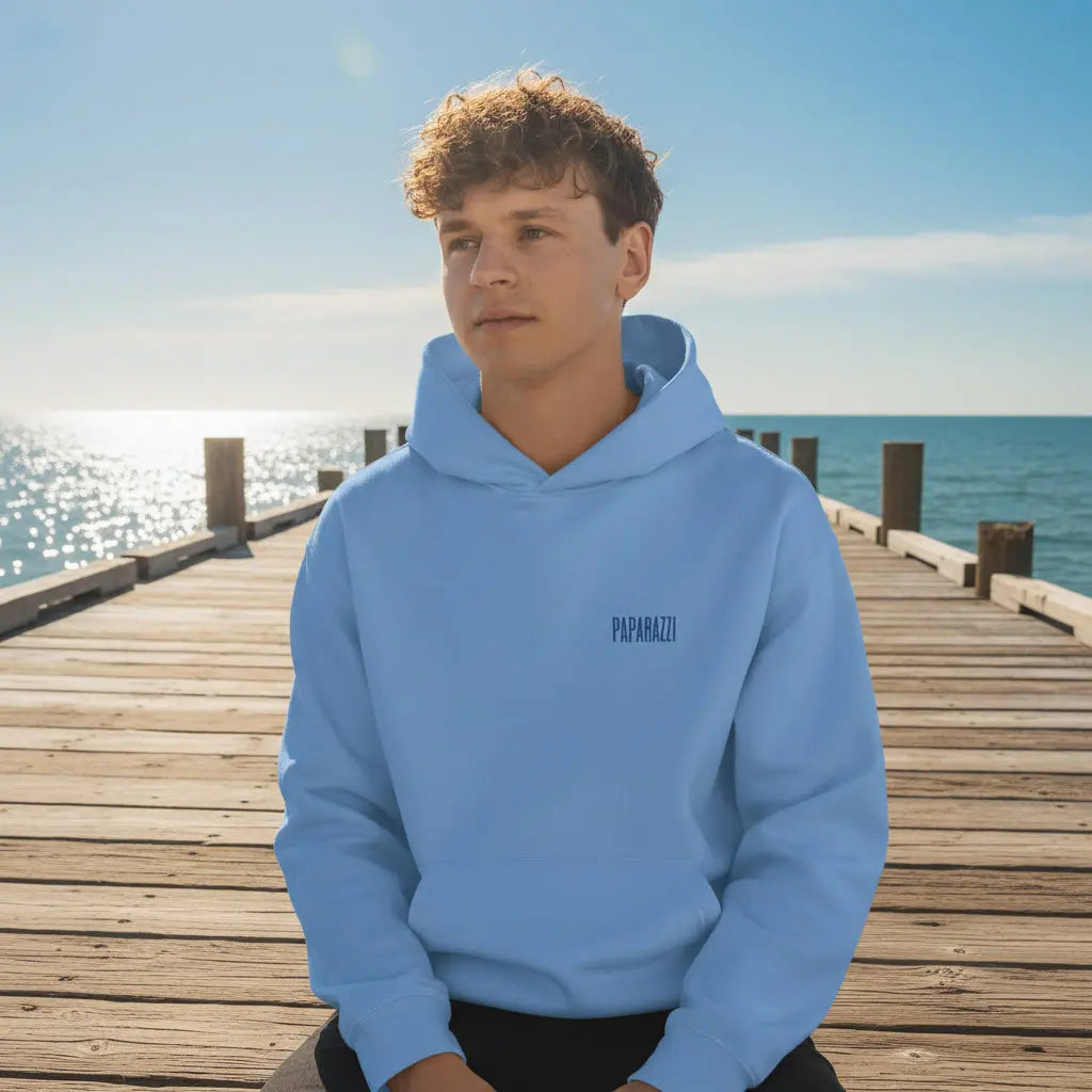 Male model wearing a Royal Paparazzi Avantgarde Carolina Blue Hoodie - Paparazzi Original
