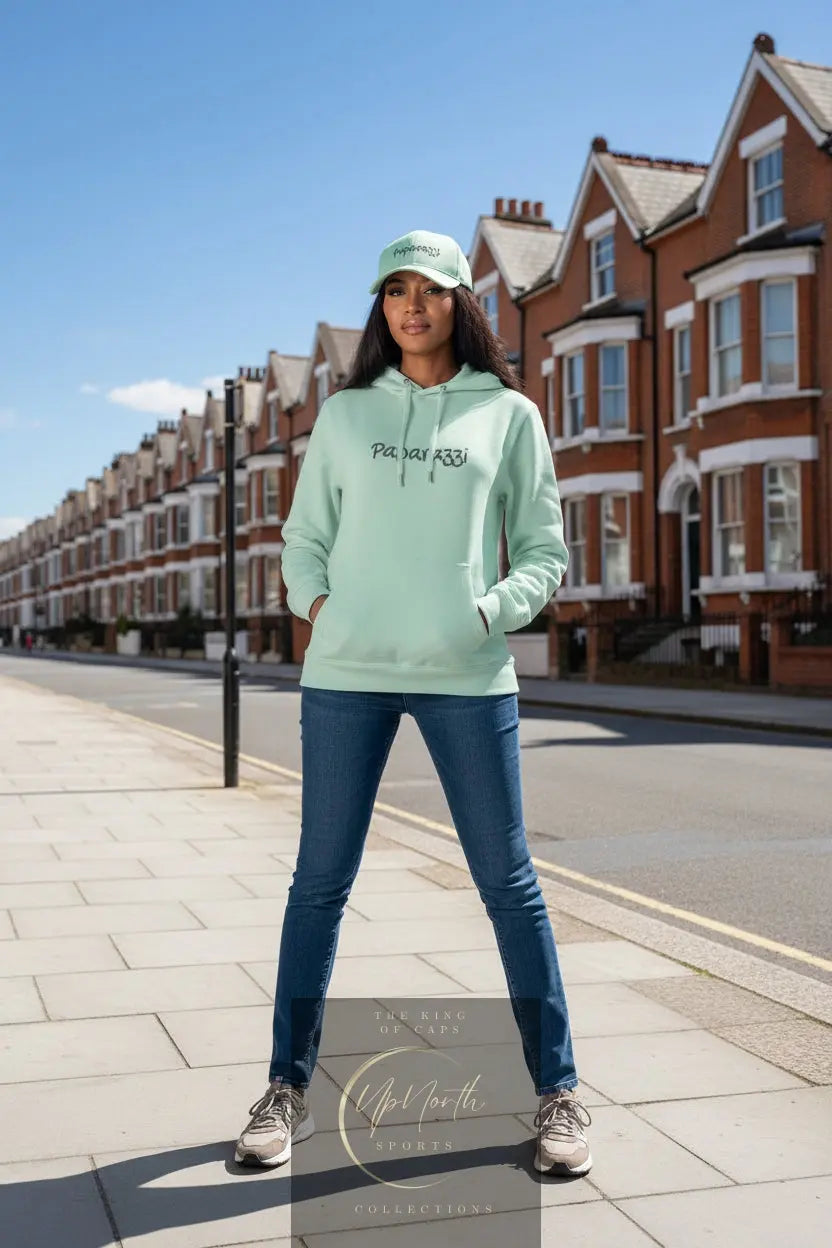 Woman model wearing a Aqua Green Paparazzi Dark Grey Hoodie - Paparazzi Original