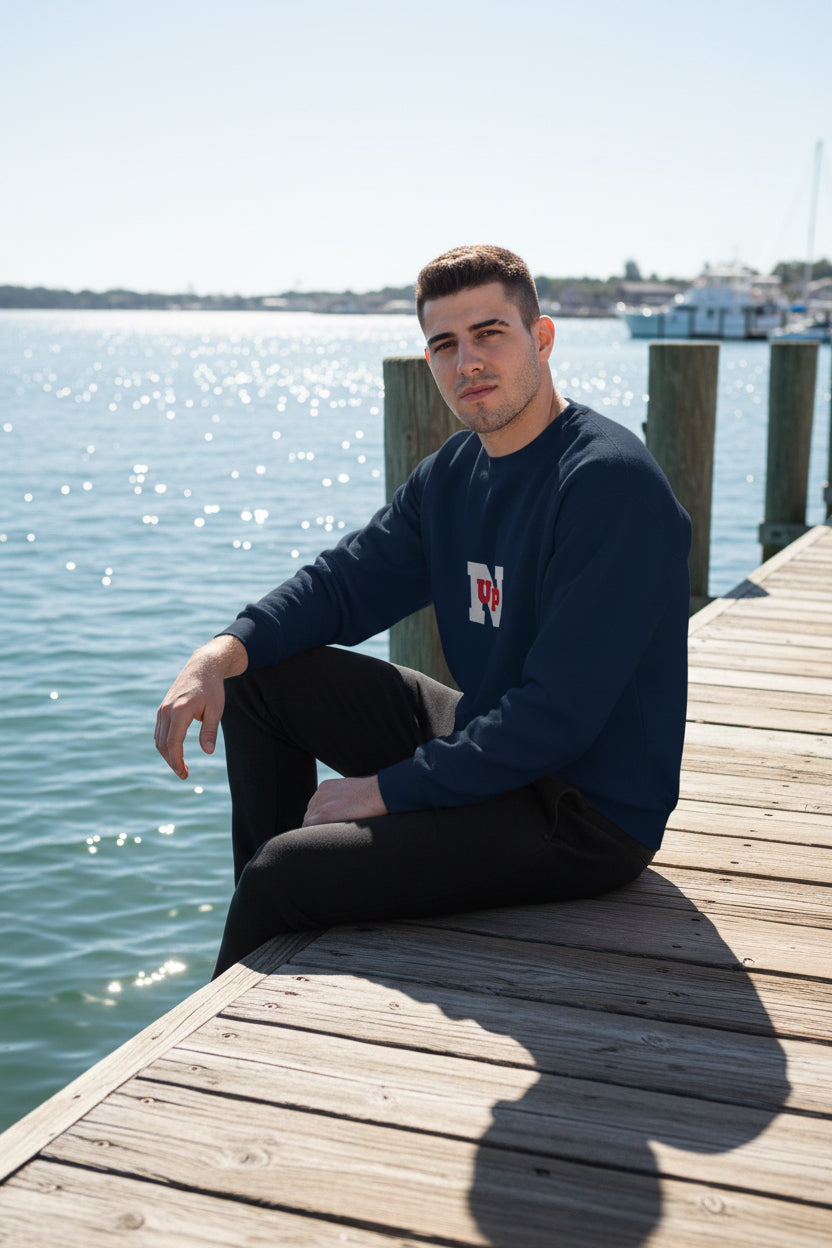 Male model wearing a Navy UpN Red Champion Sweatshirt - UpNorth SPORTS