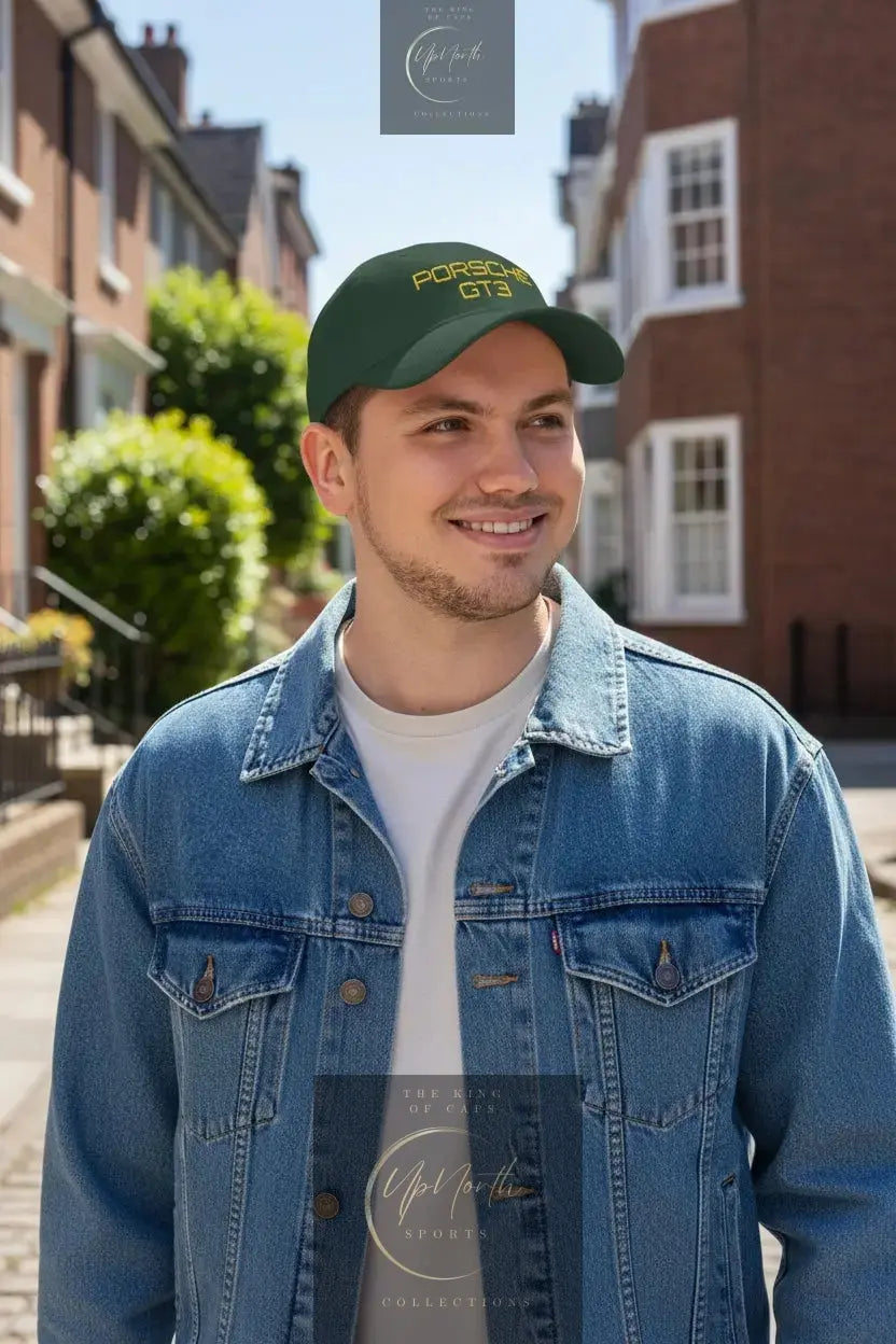 Male model wearing a Dark Green Porsche GT3 Gold Baseball Cap - UpNorth SPORTS