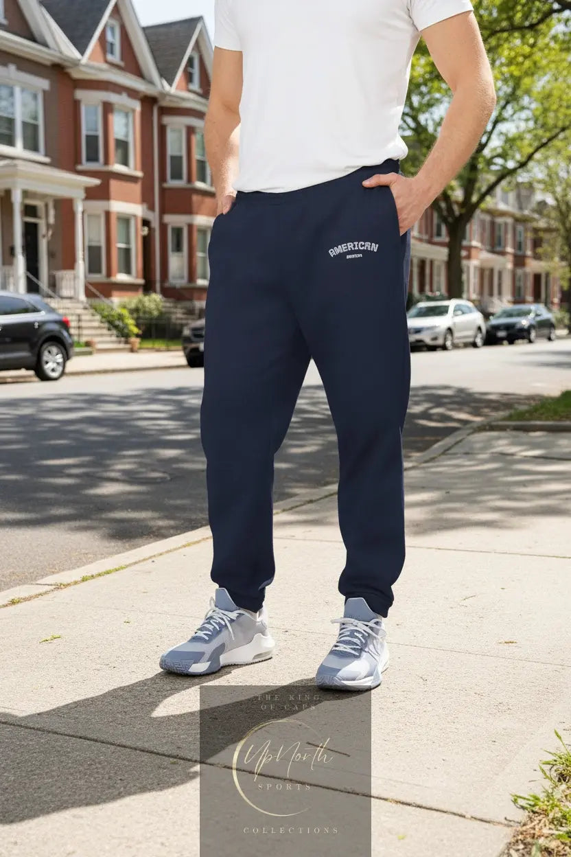Male model wearing Adidas Joggers American Edition Navy - UpNorth SPORTS