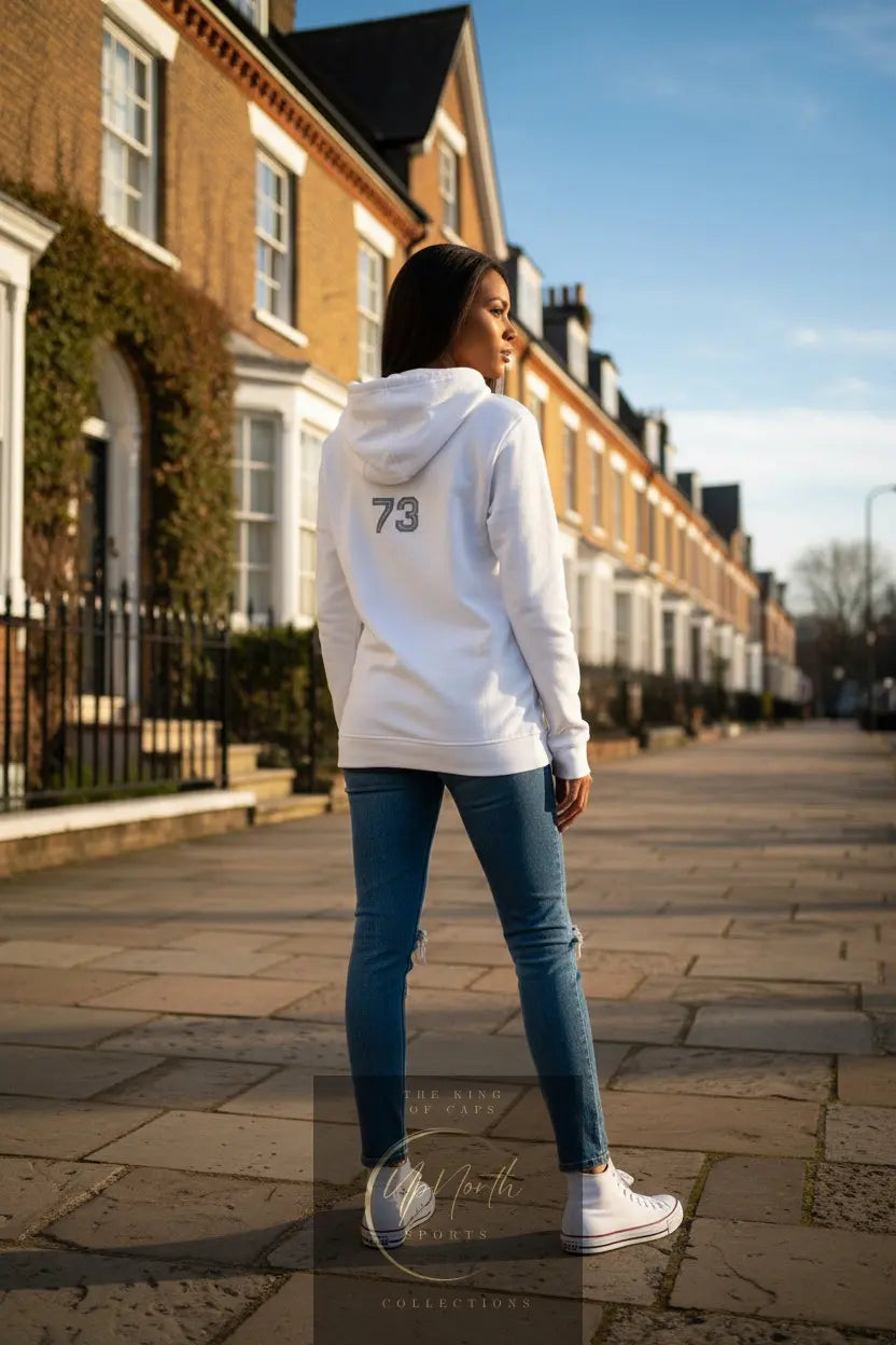 Woman model showing off backside of a White Premium Paparazzi Anniversary Adidas Hoodie - Paparazzi Original
