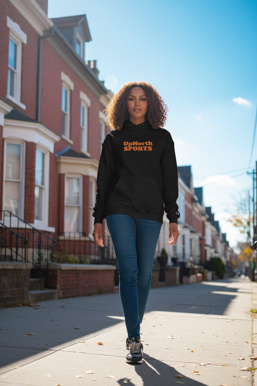 Woman model wearing a Black UpNorth Sports Orange Champion Hoodie - UpNorth SPORTS