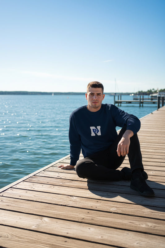 Male model wearing a Navy UpN Champion Sweatshirt - UpNorth SPORTS