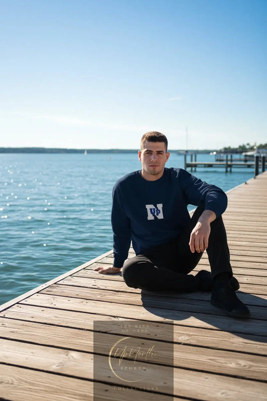 Male model wearing a Navy UpN Champion Sweatshirt - UpNorth SPORTS