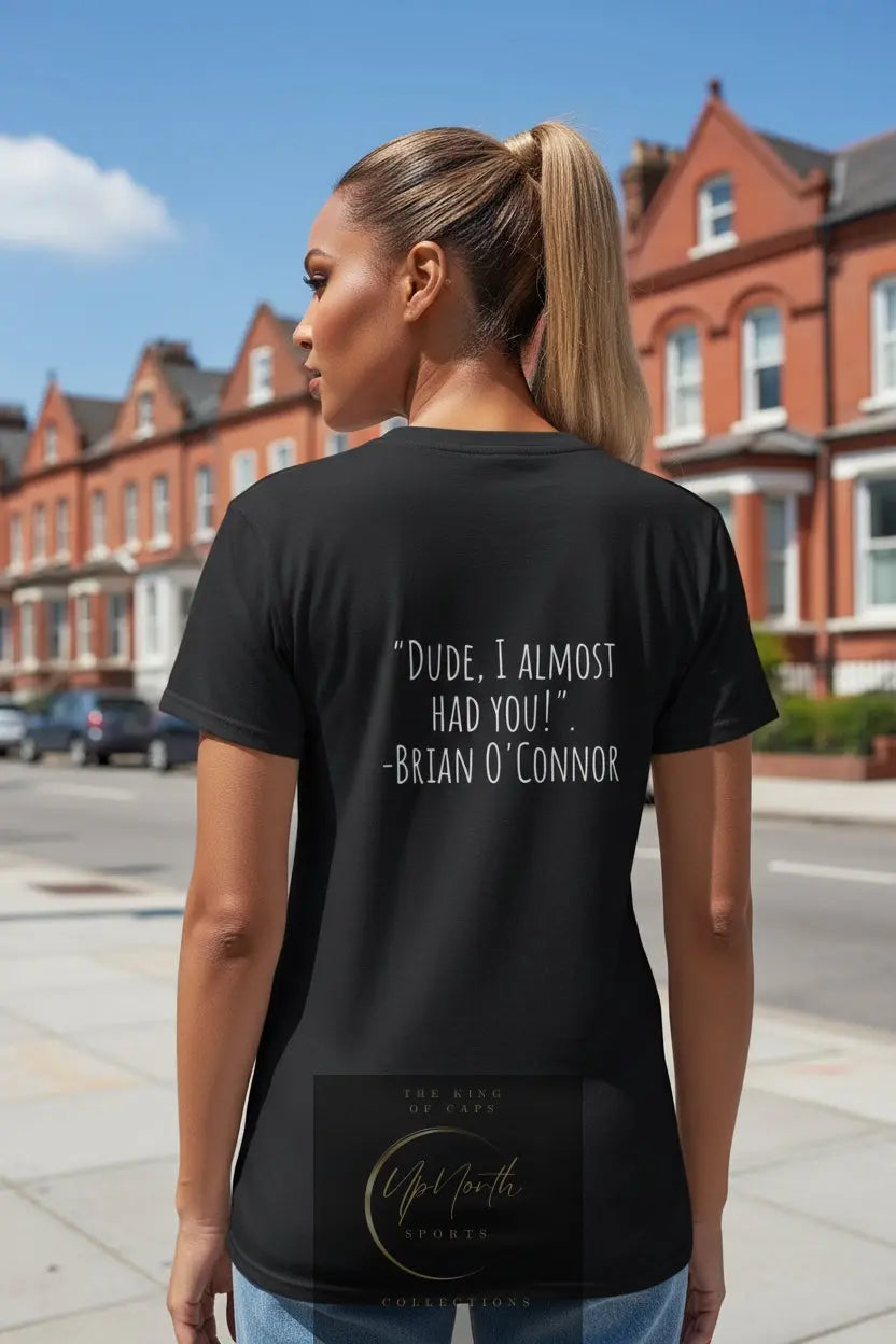 Woman model wearing a Paparazzi Brian DUDE Black T-shirt showing backside - Paparazzi Original
