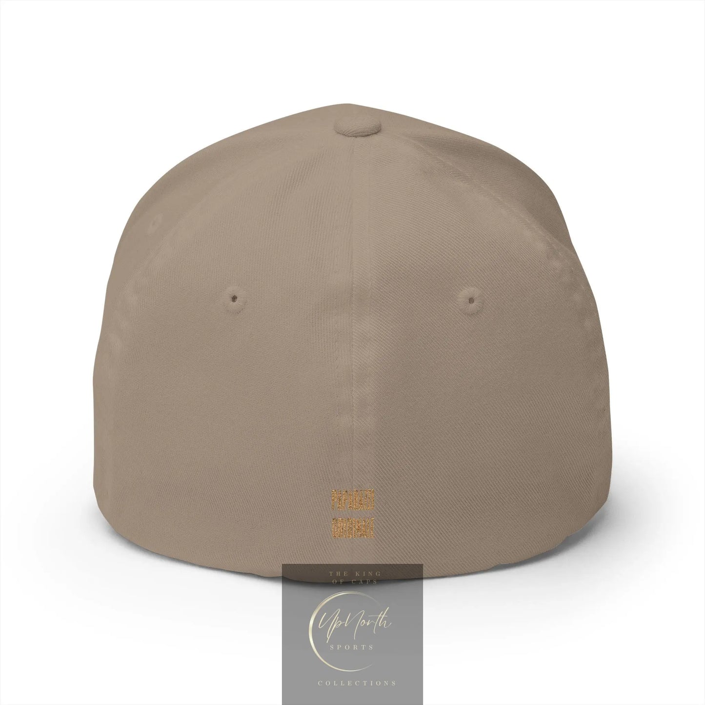 A structured baseball cap in a warm taupe-brown color, shown from the back. The cap features a small gold embroidered logo near the bottom center.