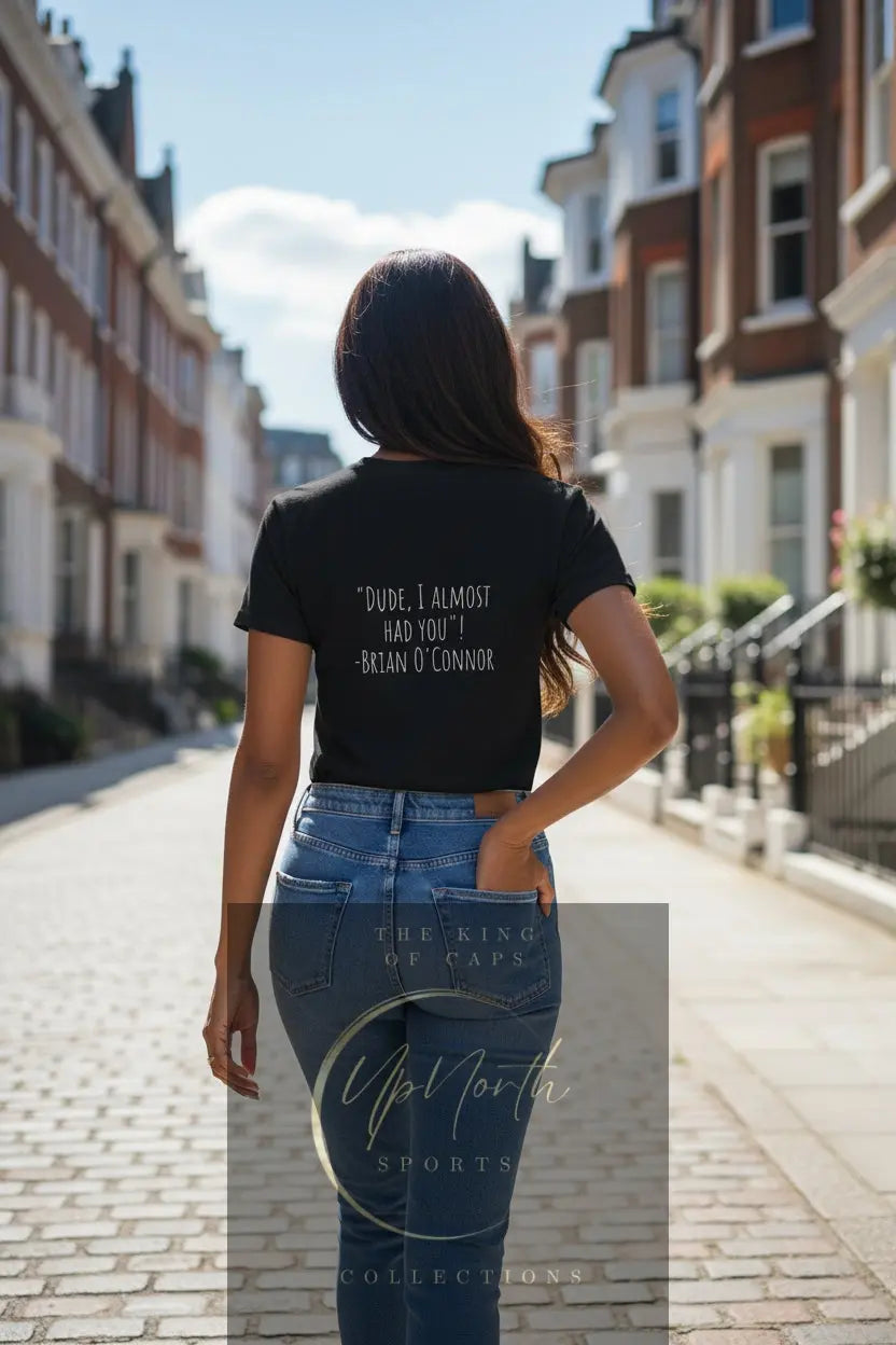 Woman model wearing a Brian DUDE Black T-shirt showing backside - UpNorth SPORTS