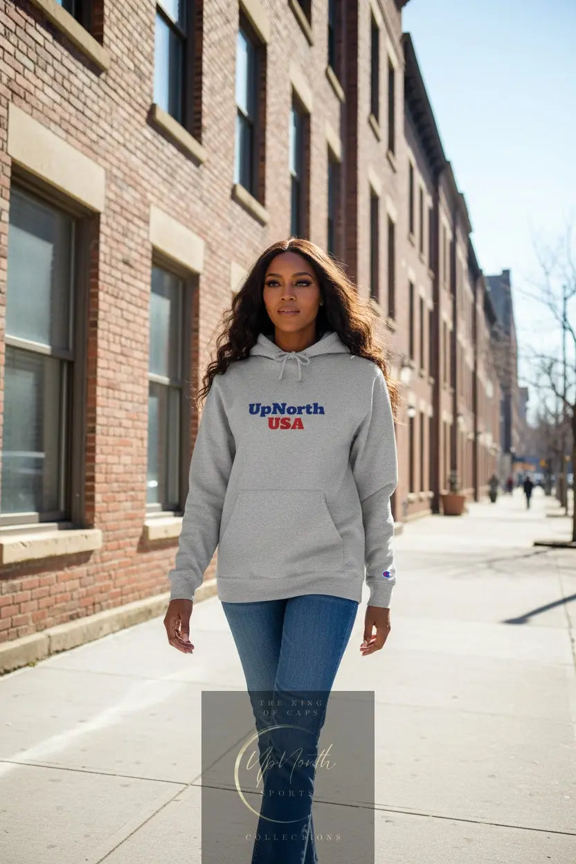 Woman model wearing a Light Steel Hoodie from Champion 4th of July Special Edition - UpNorth SPORTS