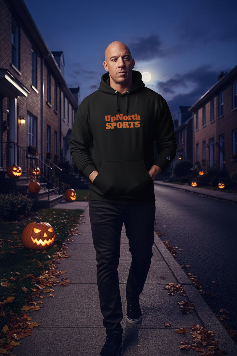 Male model wearing a Black Hoodie from Champion for Halloween - UpNorth SPORTS