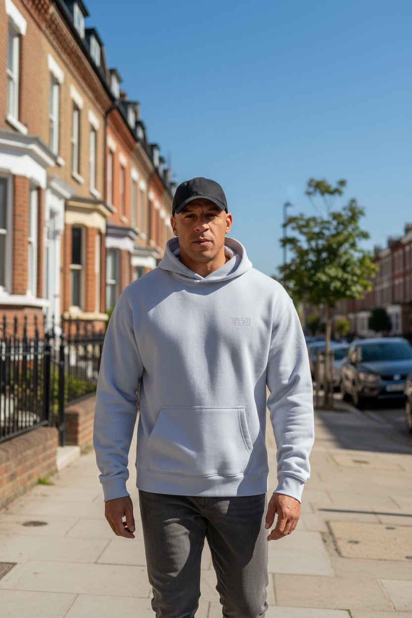 Male model wearing a White Paparazzi Avantgarde Powder White Hoodie - Paparazzi Original