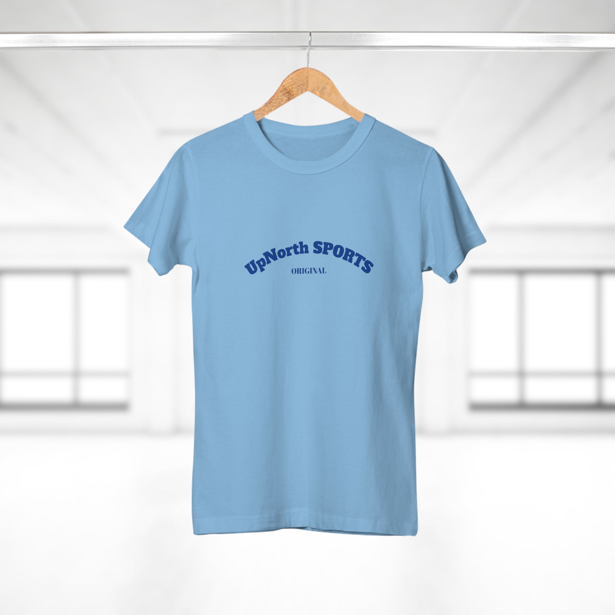 On a hanger the Women T-Shirt skyblue with navy front - UpNorth SPORTS