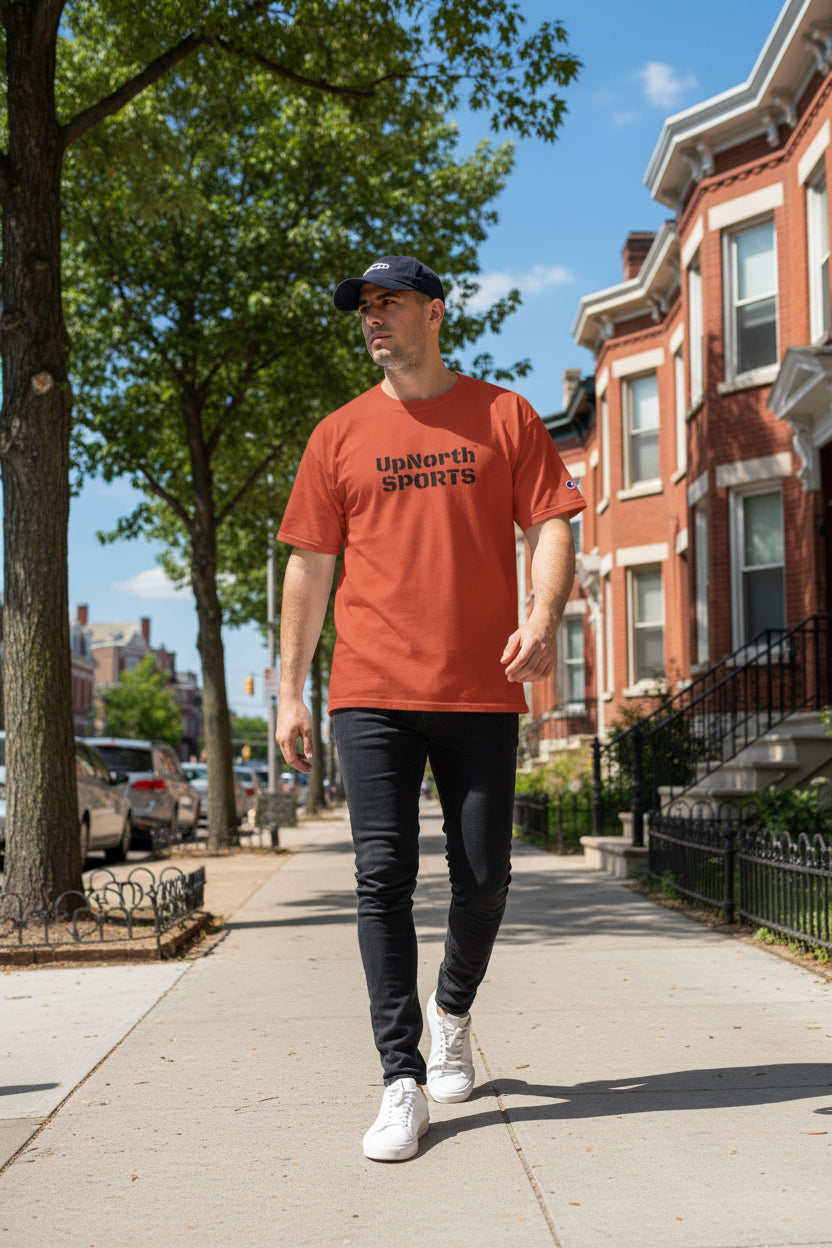 Man model wearing a UpNorthSPORTS Orange Champion T-Shirt - UpNorth SPORTS