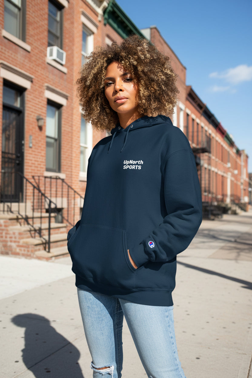 Woman model wearing a Navy UpNorth SPORTS White Logo Champion Hoodie - UpNorth SPORTS